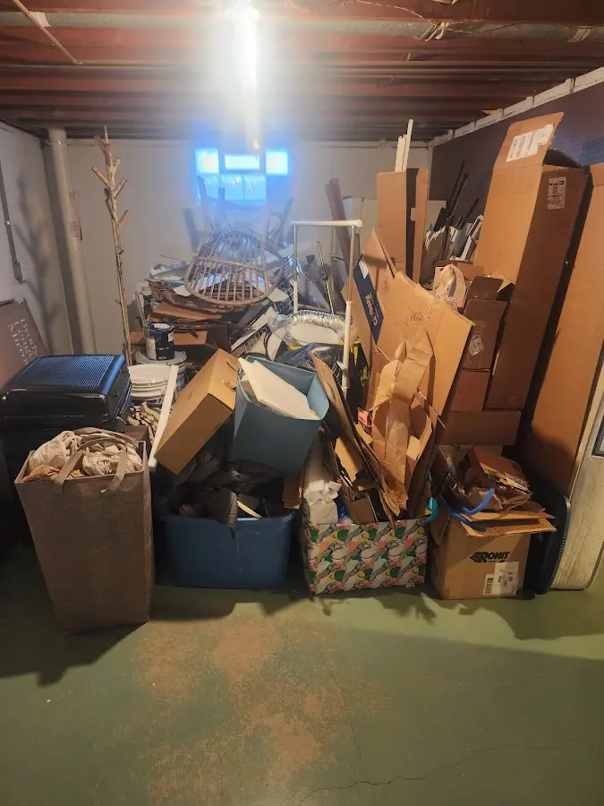 Roll-off dumpster container at job site for 2 Yard Dumpster Rental in Security-Widefield