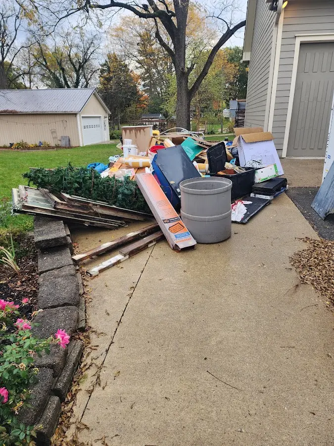 Dumpster being loaded with debris for Roofing Dumpster Rental in Security-Widefield